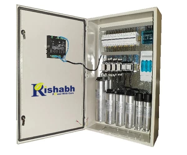 Interior of a Rishabh APFC panel: capacitor bank, duty contactors and power factor controller